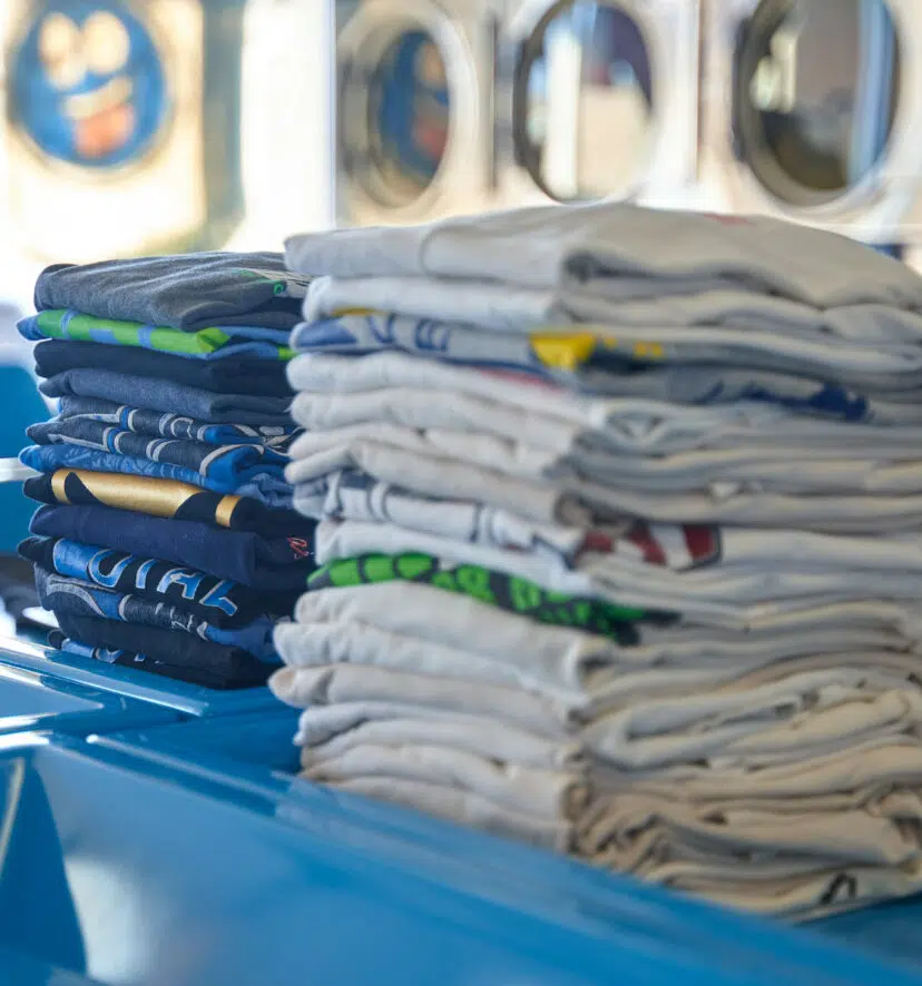 Folded towels in the on-site laundry room
